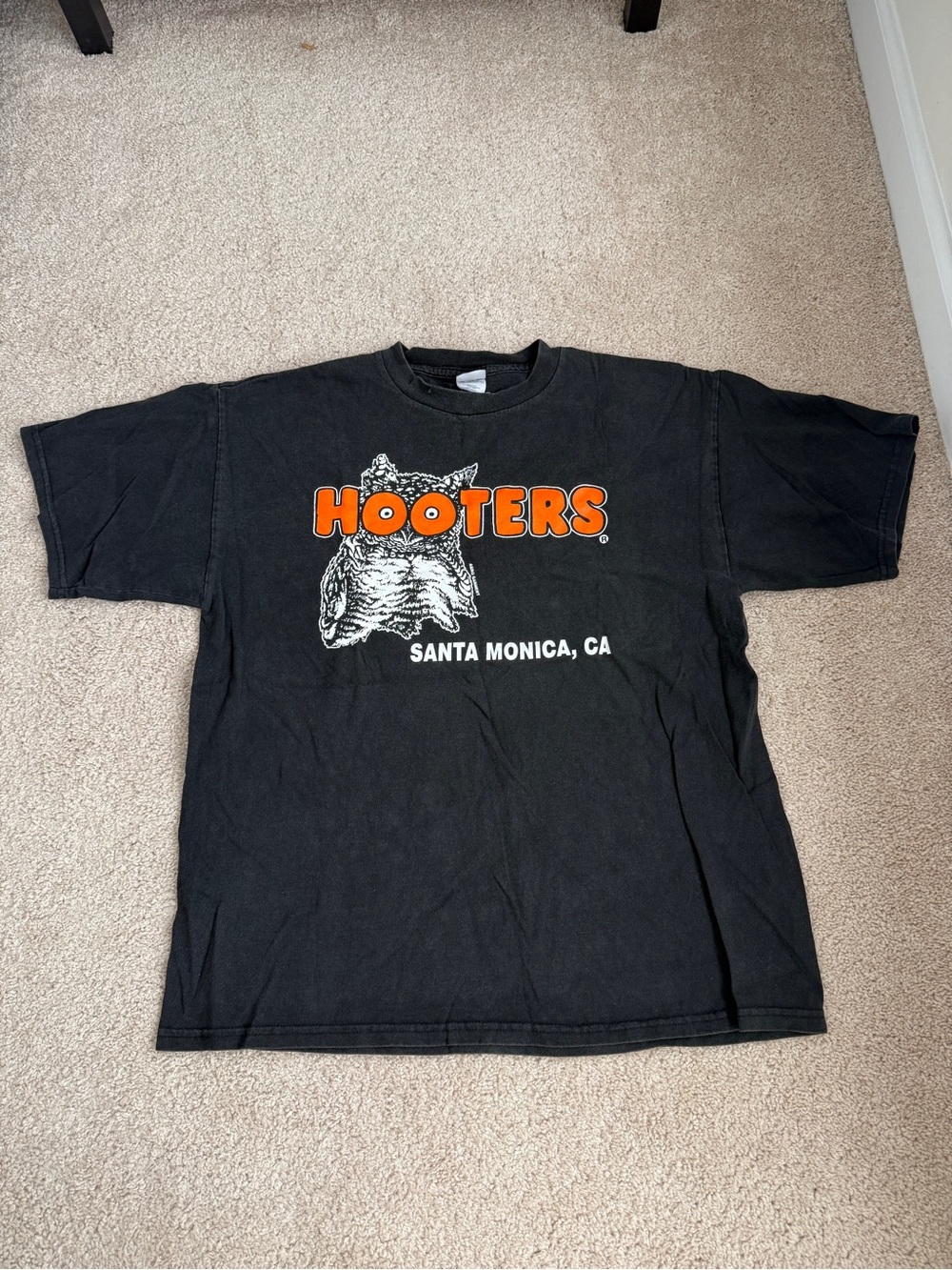 Hooters Black Tee with Orange Logo